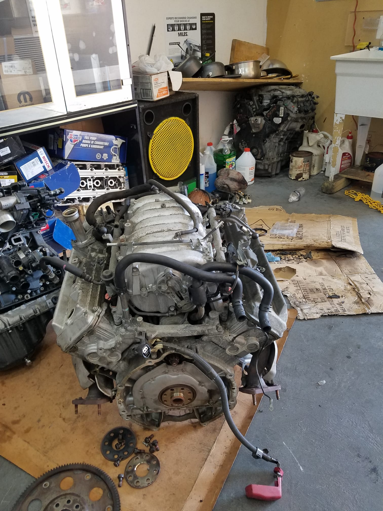 An engine on a workbench in the shop during a rebuild